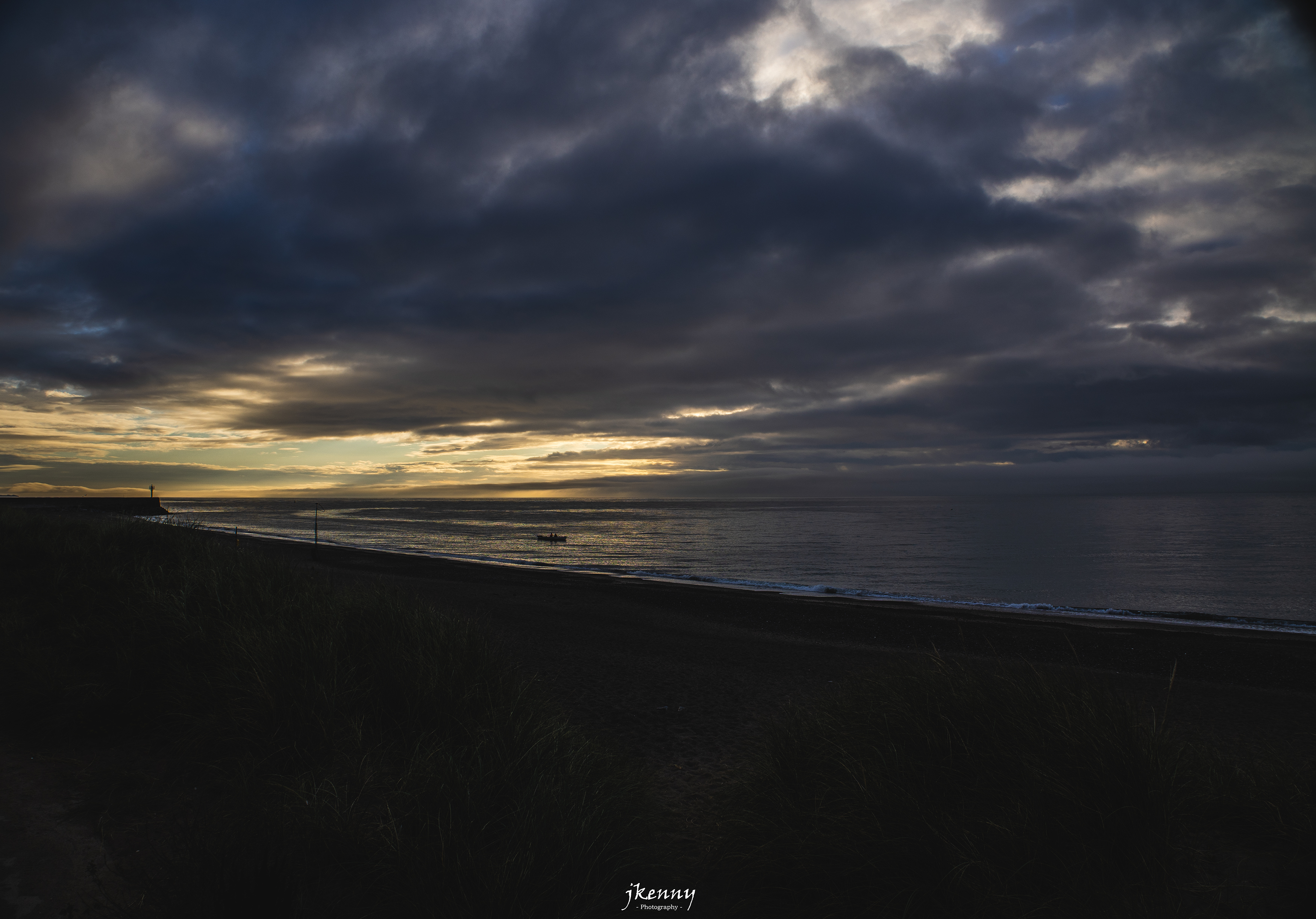 Rowing along the sea.
