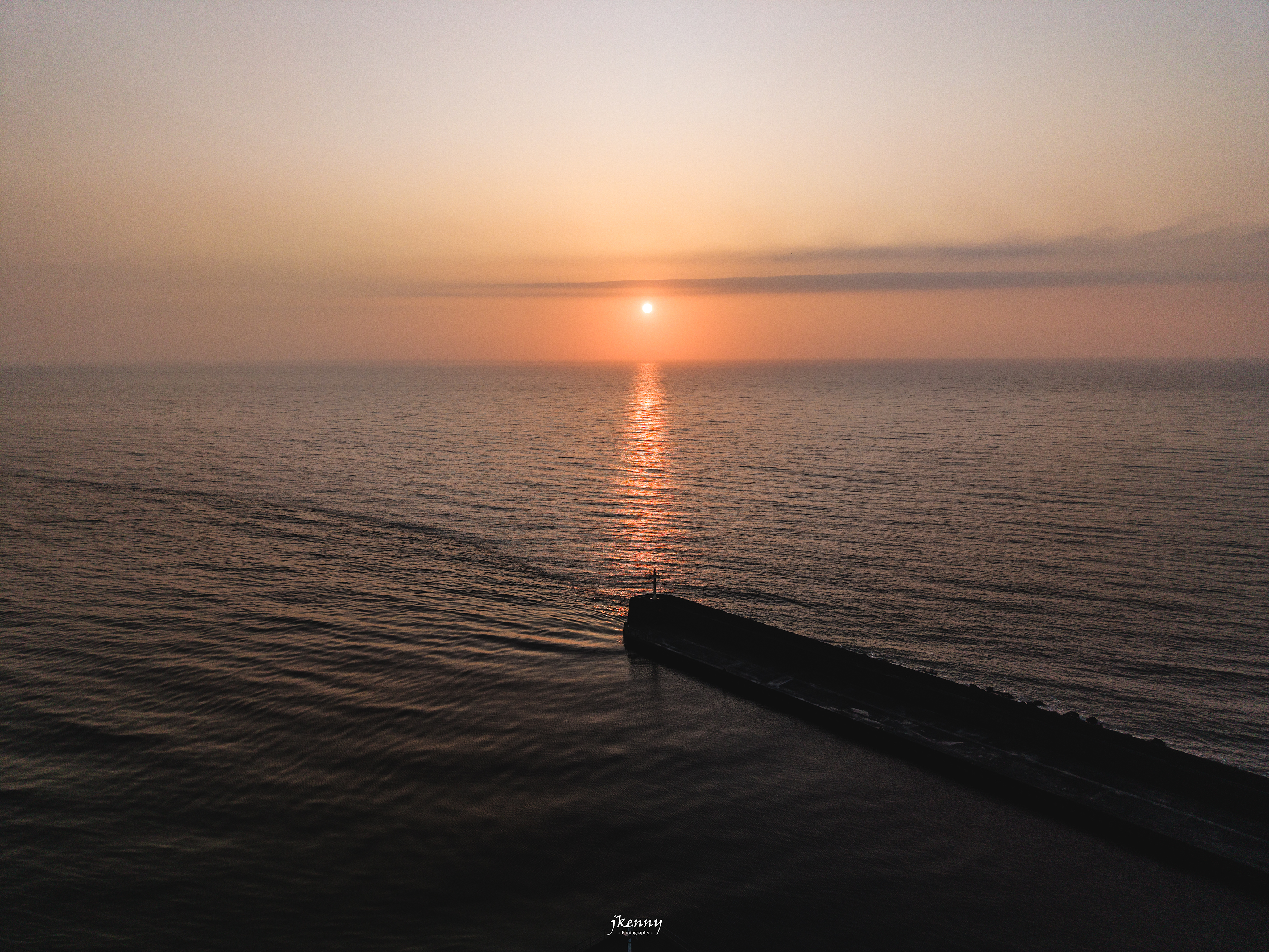 Sunrise over Arklow south pier